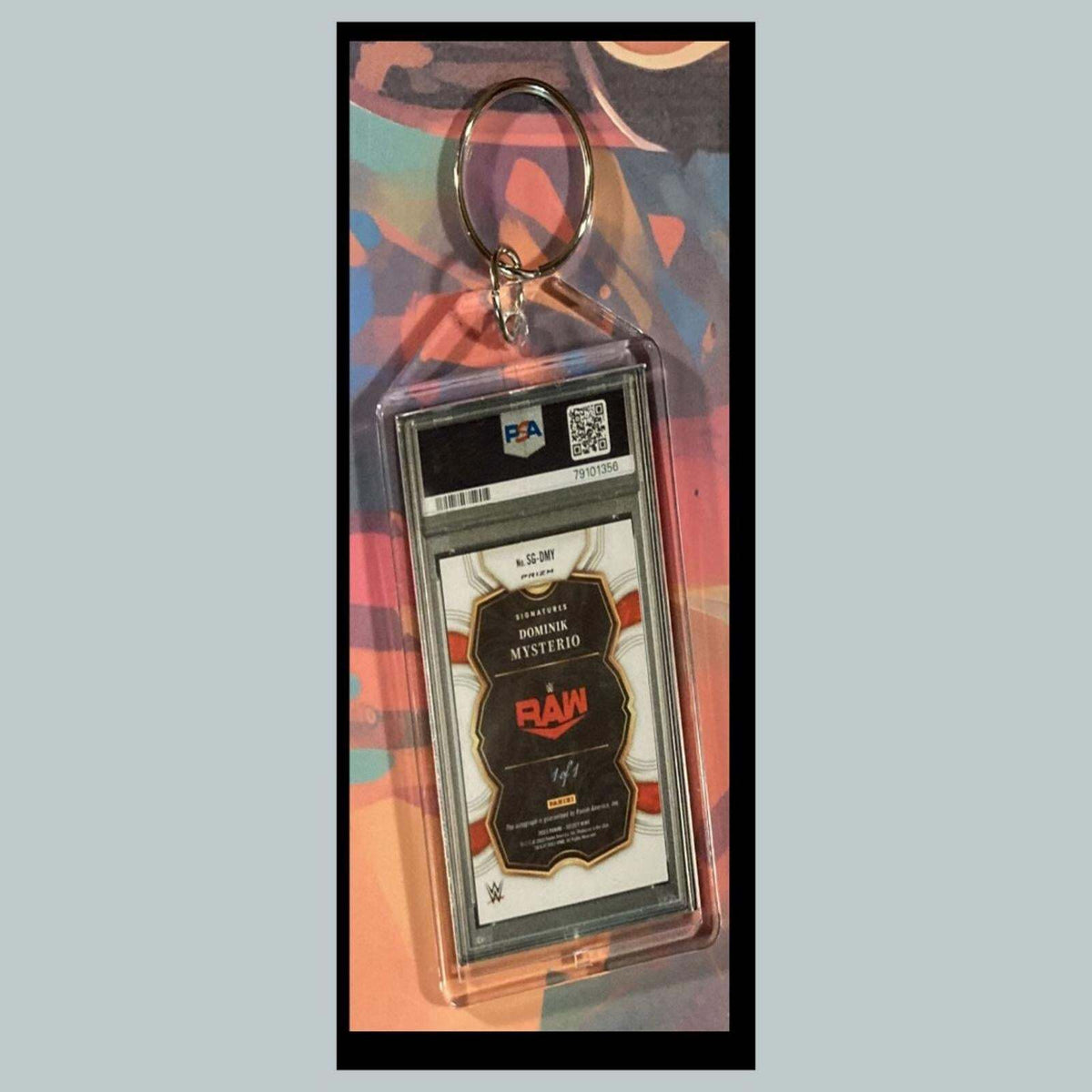 3382 Dirty Dom Mysterio Prison 2023 Panini Select Black Auto Novelty Keychain