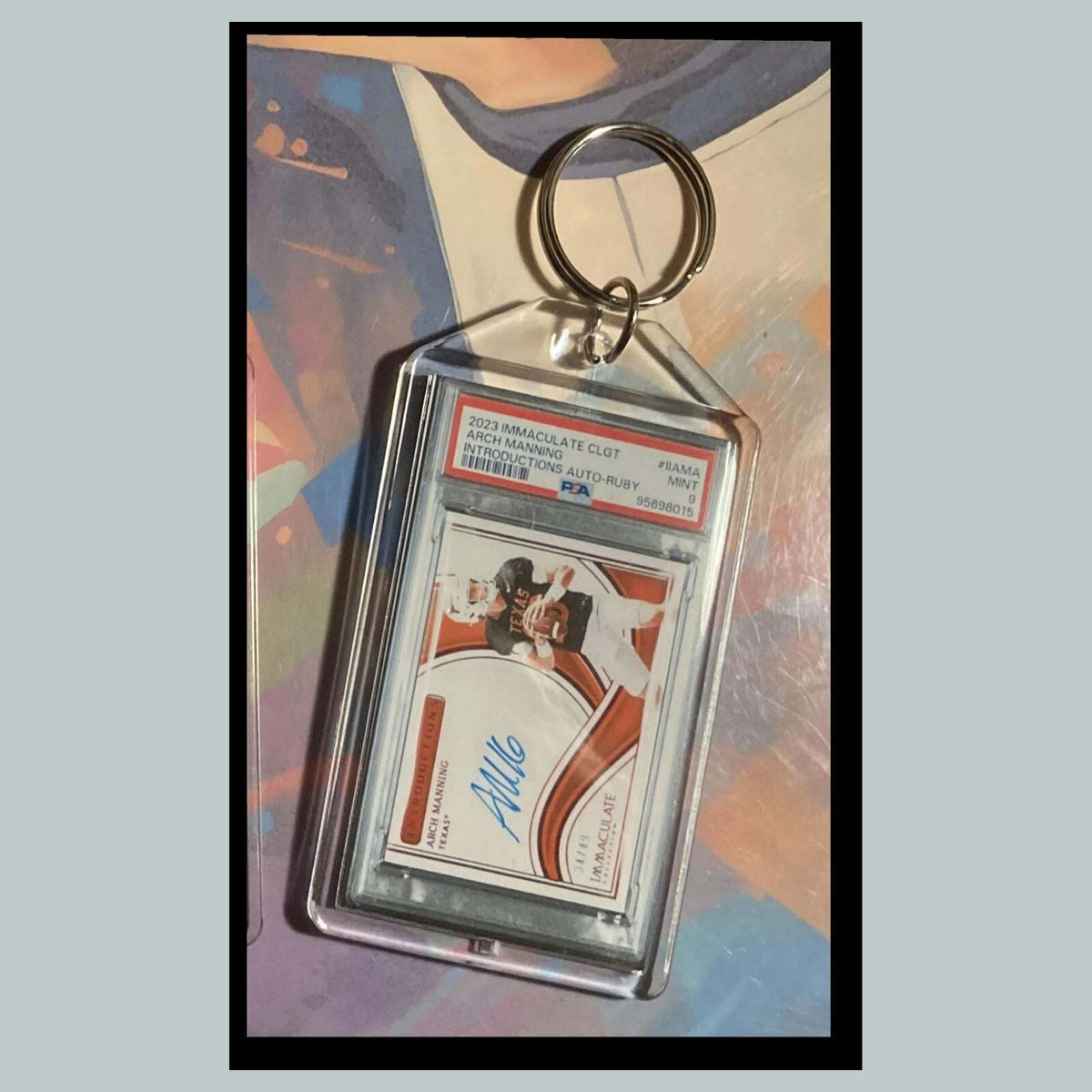3495 Arch Manning 2023 Panini Immaculate Introductions Ruby Auto Custom Keychain