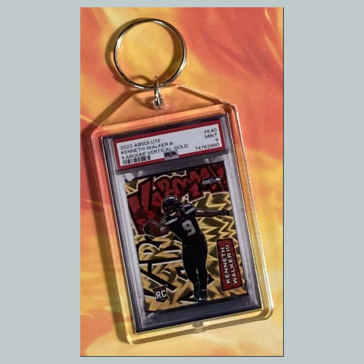 3770 Kenneth Walker III 2022 Panini Absolute Kaboom Gold Hand Made Keychain
